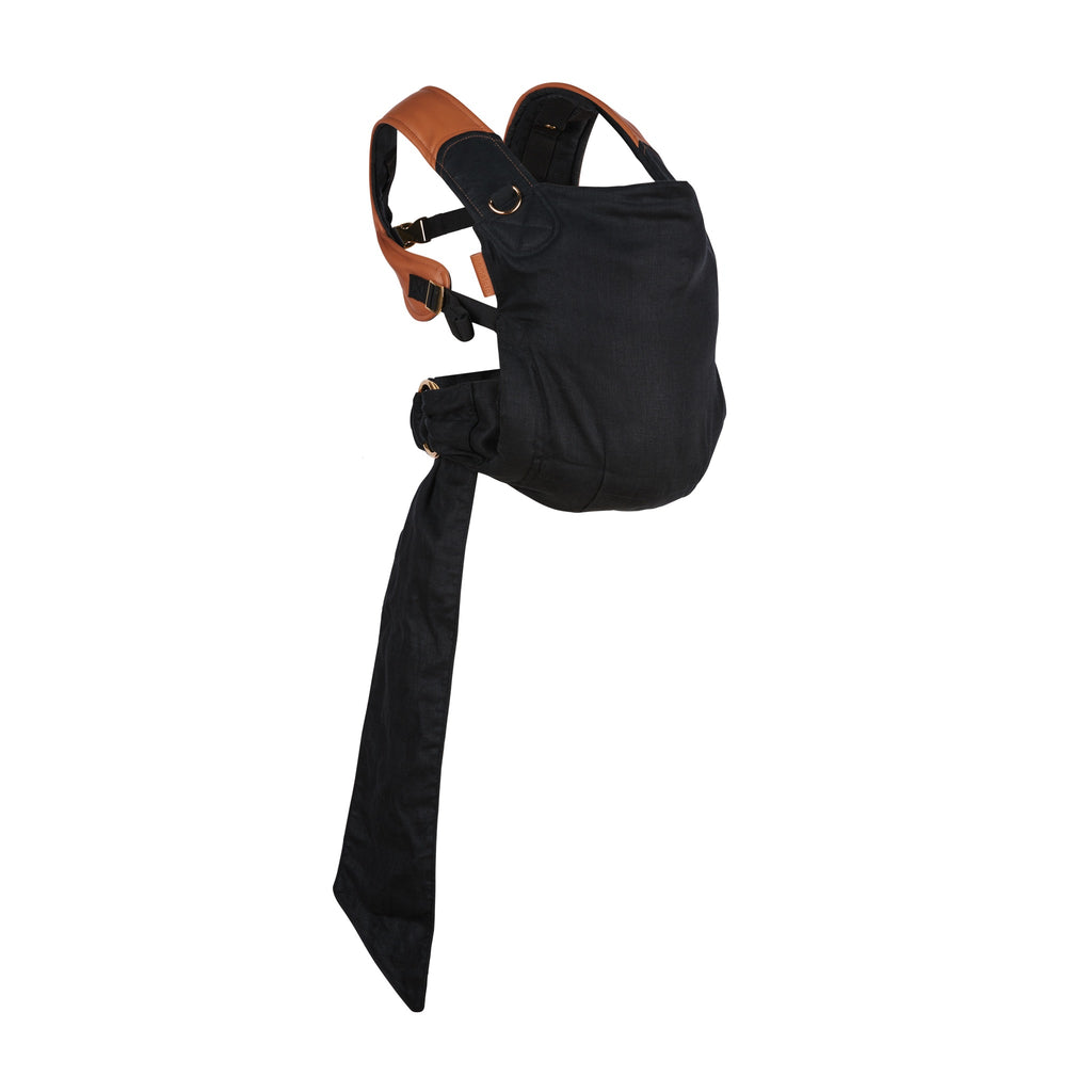 Mamatoto Nest baby carrier in black linen with leather finishes — ergonomic newborn carrier for style and function.